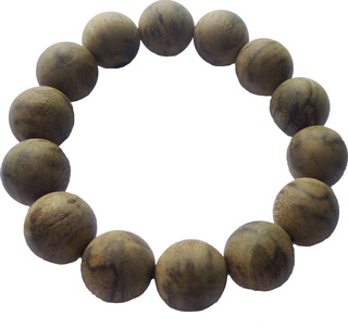 What benefits and significance do agarwood beads hold in traditional practices? 2 Agarwood%20Bead%20high%20grade lowres